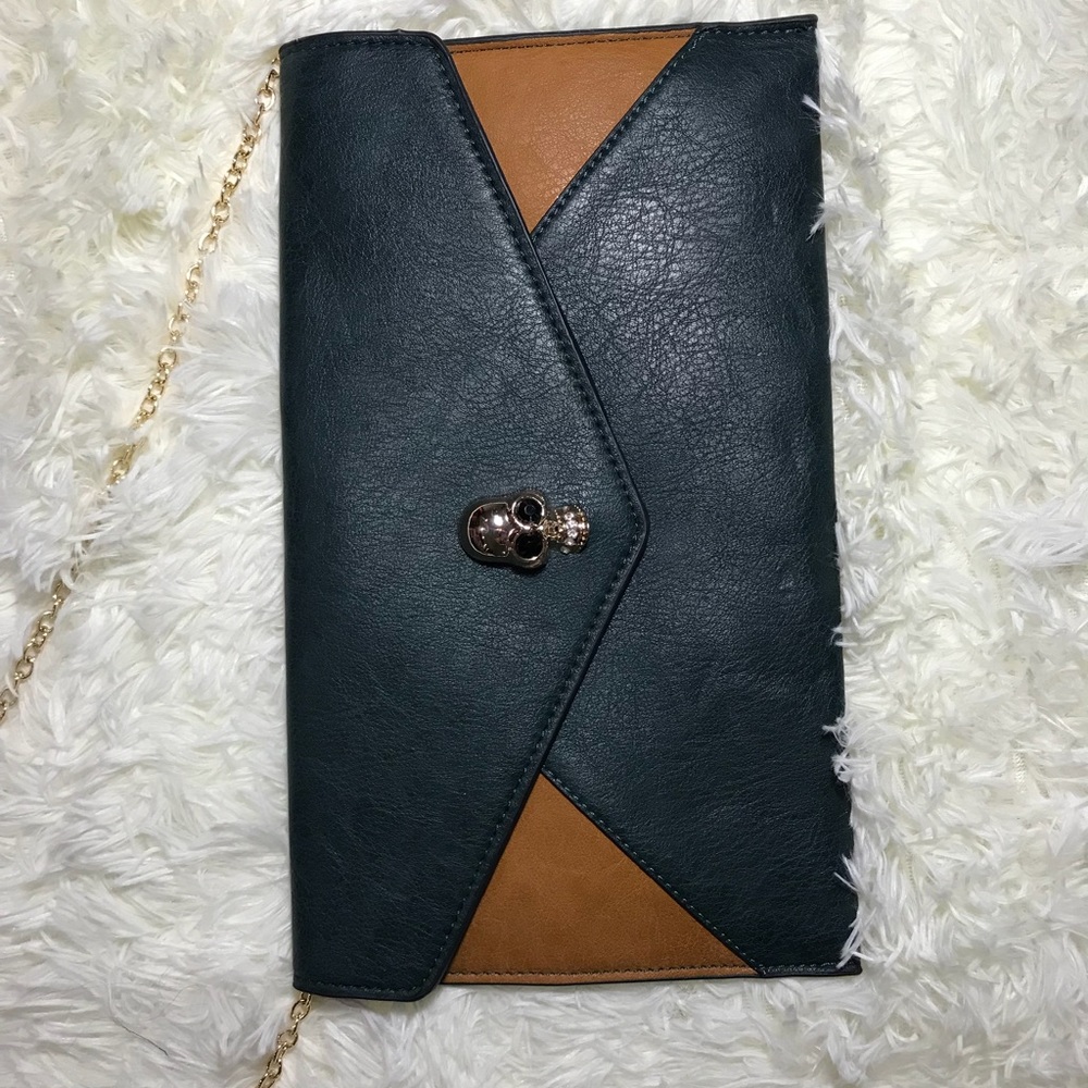 Boutique purchase clutch-inspired McQueen